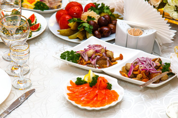 Salad with mushrooms, pickled cucumbers and tomatoes and sliced
