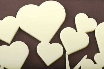 Table of milk chocolate with white chocolate hearts