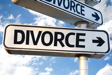 Divorce direction sign on sky background
