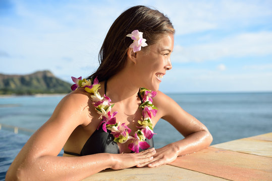 Hawaii vacations woman on holiday at beach resort