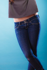 Part of body female hips. Woman in jeans