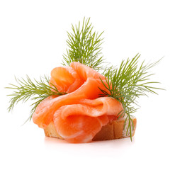 sandwich or canape with salmon on white background  cutout