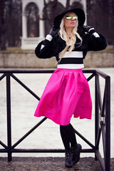 Beautiful woman in posing outdoors