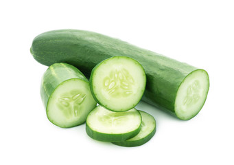Cucumber and slices isolated over white background © sarawutk