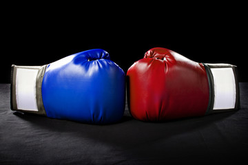 boxing gloves or martial arts gear on a black background