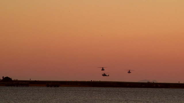 Helicopters returning back to base in the evening