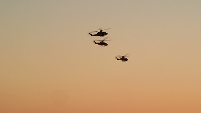 Helicopters returning back to base in the evening