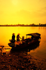 Life of vietnamese florist vendor in sunset, hanoi, vietnam