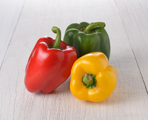 Fresh peppers on wooden