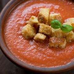 Close-up of Gazpacho with croutons, selective focus