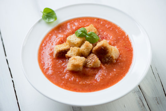 Close-up of Gazpacho with croutons, horizontal shot