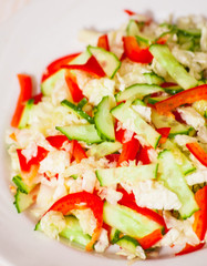 Chinese cabbage salad with red bell pepper and cucumber