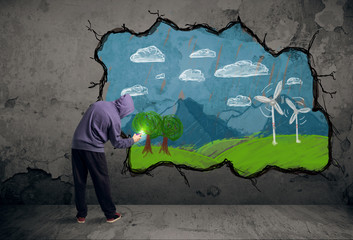 Young urban painter drawing