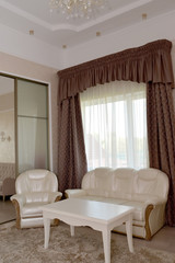 Interior of a living room of a double hotel room 