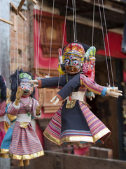 Souvenir puppets hanging in  the street shop in Bhaktapur, Nepal