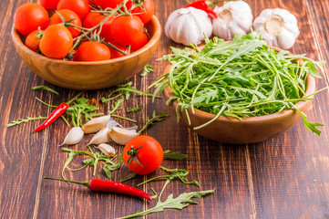 Tomatoes, arugula, pepper, garlic