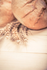 Tasty buns on wooden background