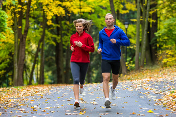 Healthy lifestyle - woman and man running