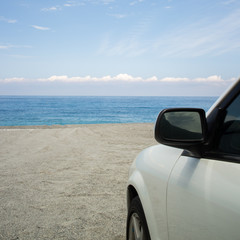 Fototapeta na wymiar road trip car summer beach sea ocean sky