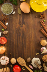 herbs and spices on wood