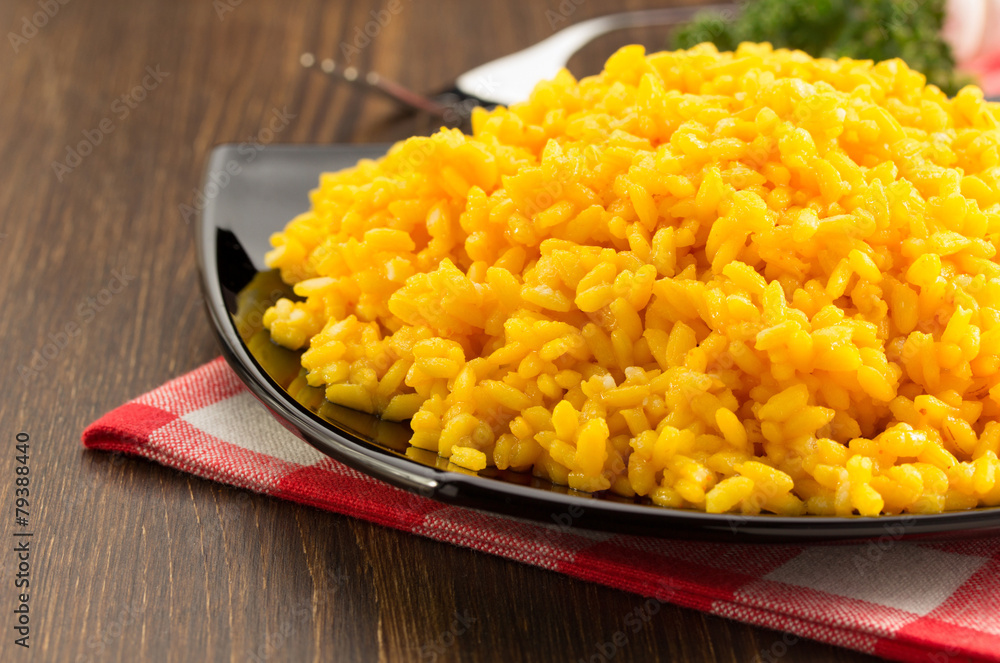 Sticker bowl full of rice on wood