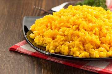 bowl full of rice on wood