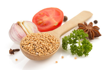mustard spices spoon on white