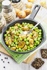 Kidneys with green peas and curry