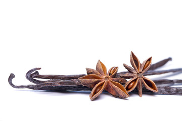 Close view of vanilla pods and anise stars.