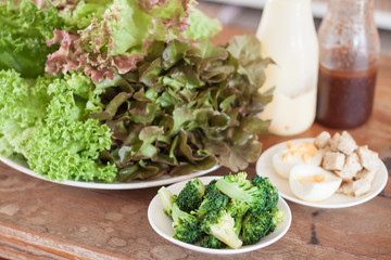 Fresh hydroponic vegetables on wooden table