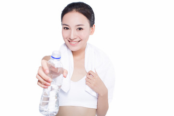 healthy asian woman with towel and water bottle