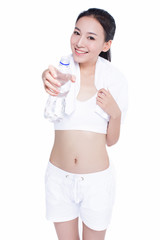 healthy asian woman with towel and water bottle