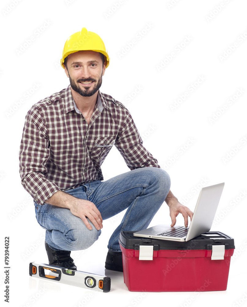 Wall mural carpenter with laptop