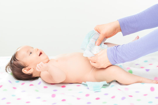 Mom Changing Diaper Her Little Baby Girl