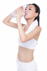 healthy asian woman with towel and water bottle