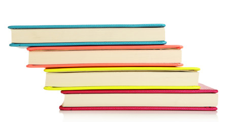 Colorful notebooks, isolated on white