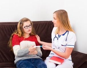 Gynecologist Helping Pregnant Teenager