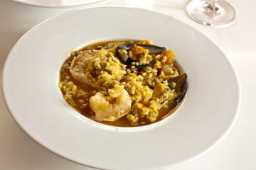 A photo of seafood paella, a traditional Spanish rice dish