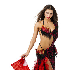 Woman traditional Spanish Flamenco dancer dancing in a red dress