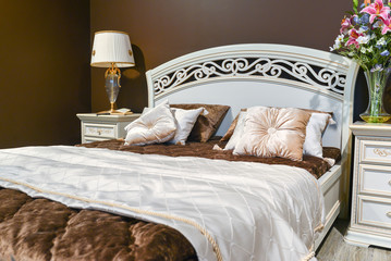 Elegant bedroom interior with  large bed