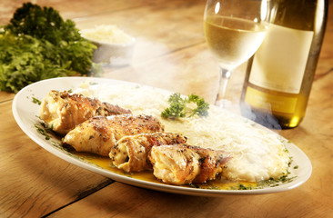 A plateful of grilled chicken thighs with white wine