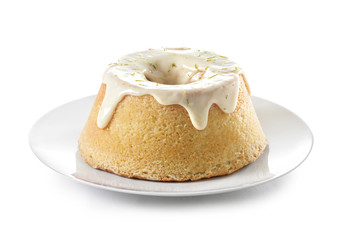 A lemon sponge cake with icing and lime rind