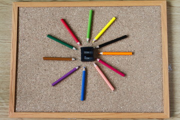 Board and numbered and colored pencils