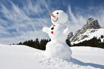 Funny snowman against Swiss Alps - 79402078