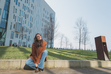 Fototapeta premium Beautiful girl posing in an urban context