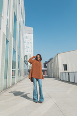 Beautiful girl posing in an urban context
