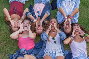 group of kids shouting or singing