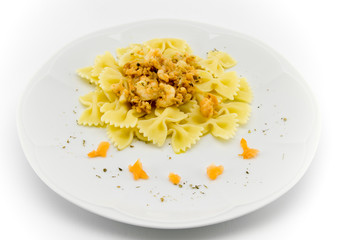 italian pasta called butterflies with shrimp salmon and basil