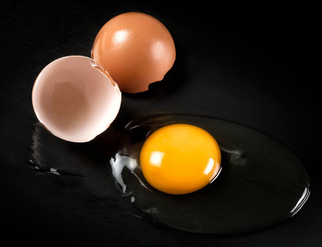 Raw Egg with Shell on Black Shale