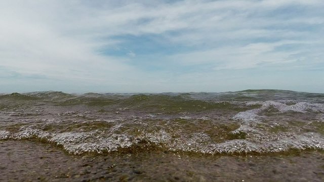 Waves on a sand beach Lake Michigan waterfront